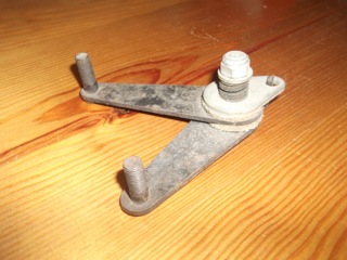Van arm (rear door check)